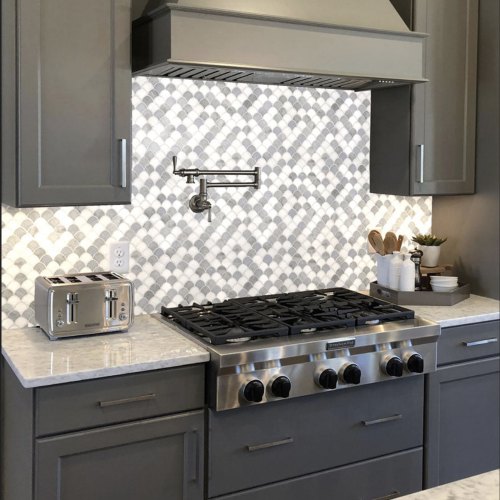 gray and white fish scale kitchen back splash
